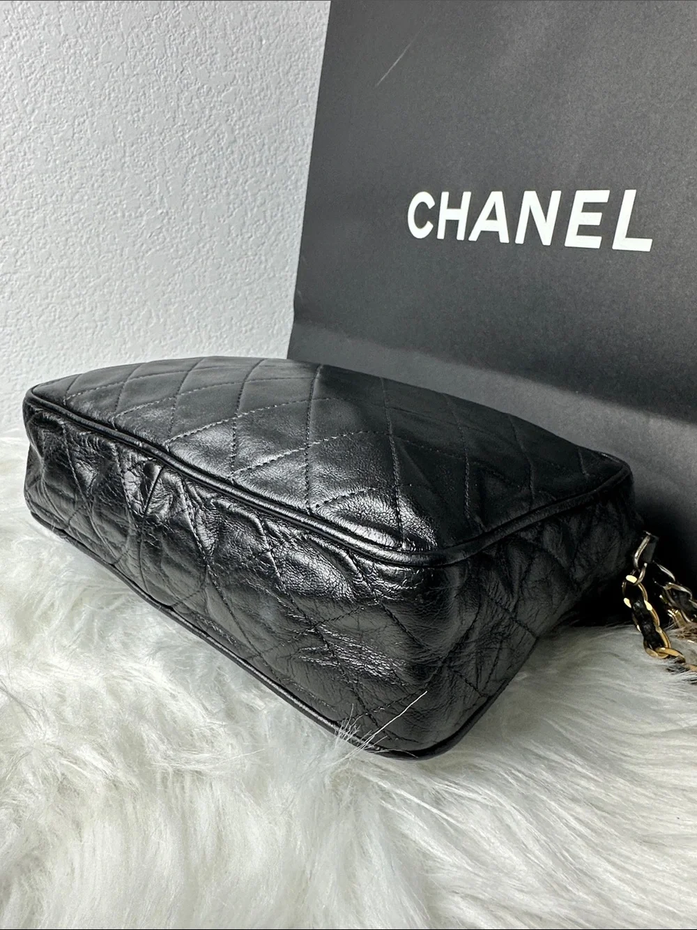 CHANEL Black Quilted Lambskin Crossbody with Tassel and Chain